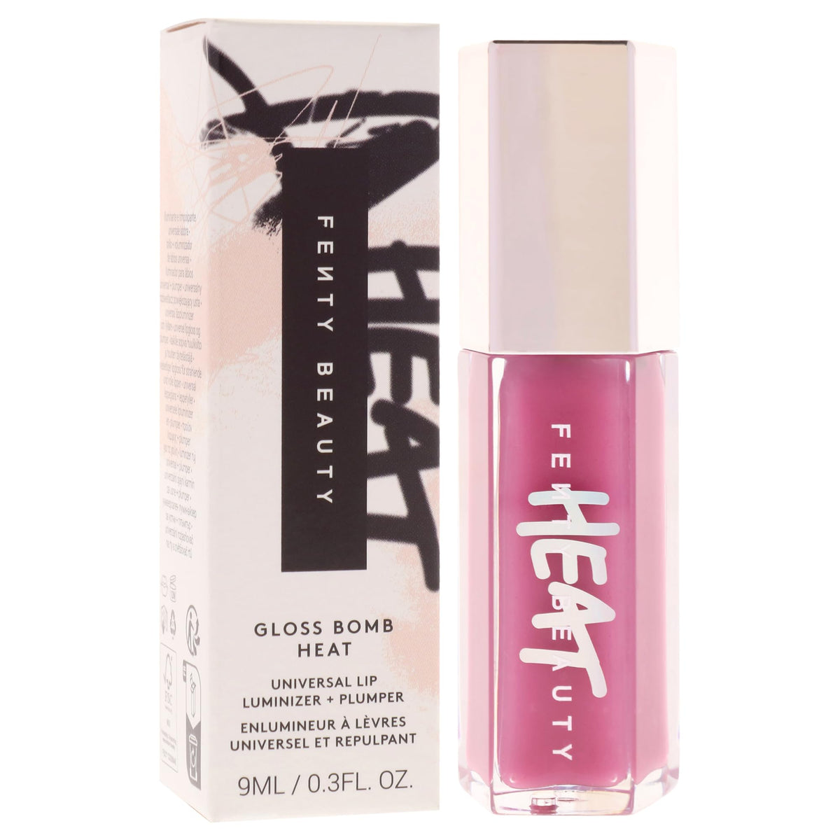 Compact gloss tube of Fenty Gloss Bomb Heat ready for application.