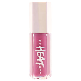 Gloss Bomb Heat swatch shows soft lavender tint for everyday wear.