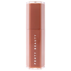 Fenty Beauty Gloss Bomb Stix Spice Cold swatch shows smooth balm-like glide