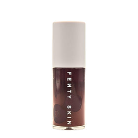 Fenty Beauty Treatz lip oil applicator demonstrates silky, mess-free application for smooth lips.