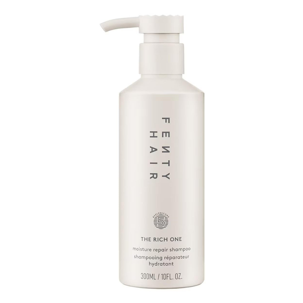 Fenty Hair Rich One Moisture Repair Shampoo bottle on a vanity, highlighting hydration.
