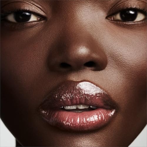 FENTY RIRI Lip Gloss on lip shows natural shimmer and glow