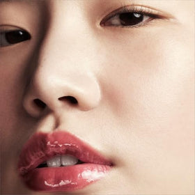 FENTY RIRI Lip Gloss over lipstick adds dimension and depth