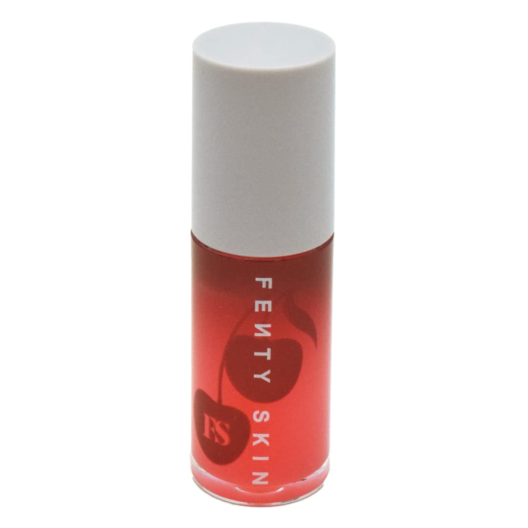 Fenty Skin Cherry Treat lip oil tube showing glossy hydration.