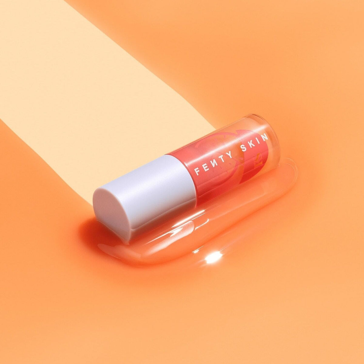 Doe-foot applicator from Fenty Treatz Lip Oil for smooth, cushiony glide.