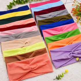 FEQO non-slip headband during workouts provides secure fit.