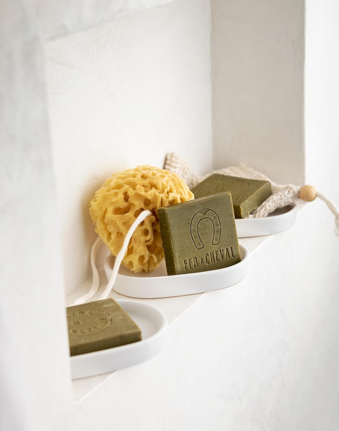 Fer à Cheval multi-use olive soap ideal for hands, body, and cleaning.