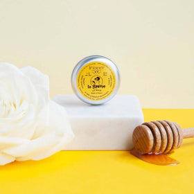 Feret Parfumeur Powder Rose Balm applied on lips for silky moisture