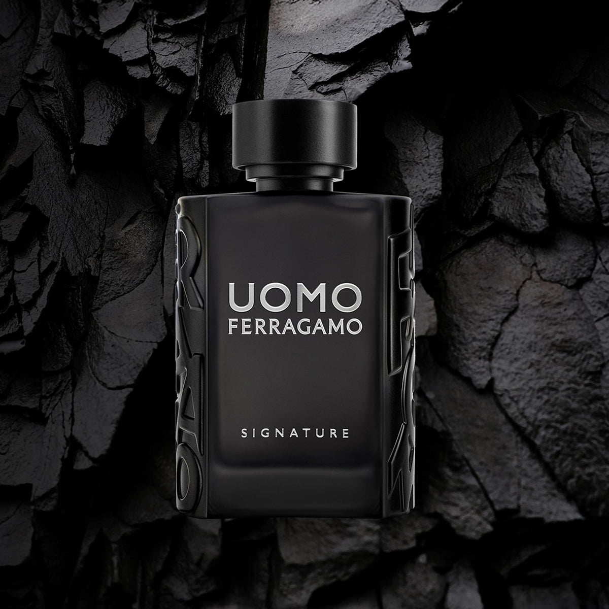 Ferragamo Uomo Signature bottle shadow profile emphasizes bold presence.