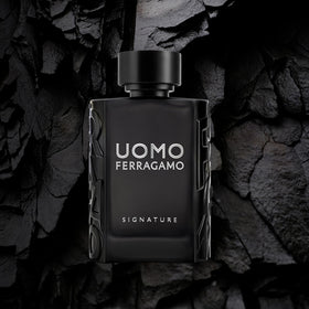 Ferragamo Uomo Signature bottle shadow profile emphasizes bold presence.