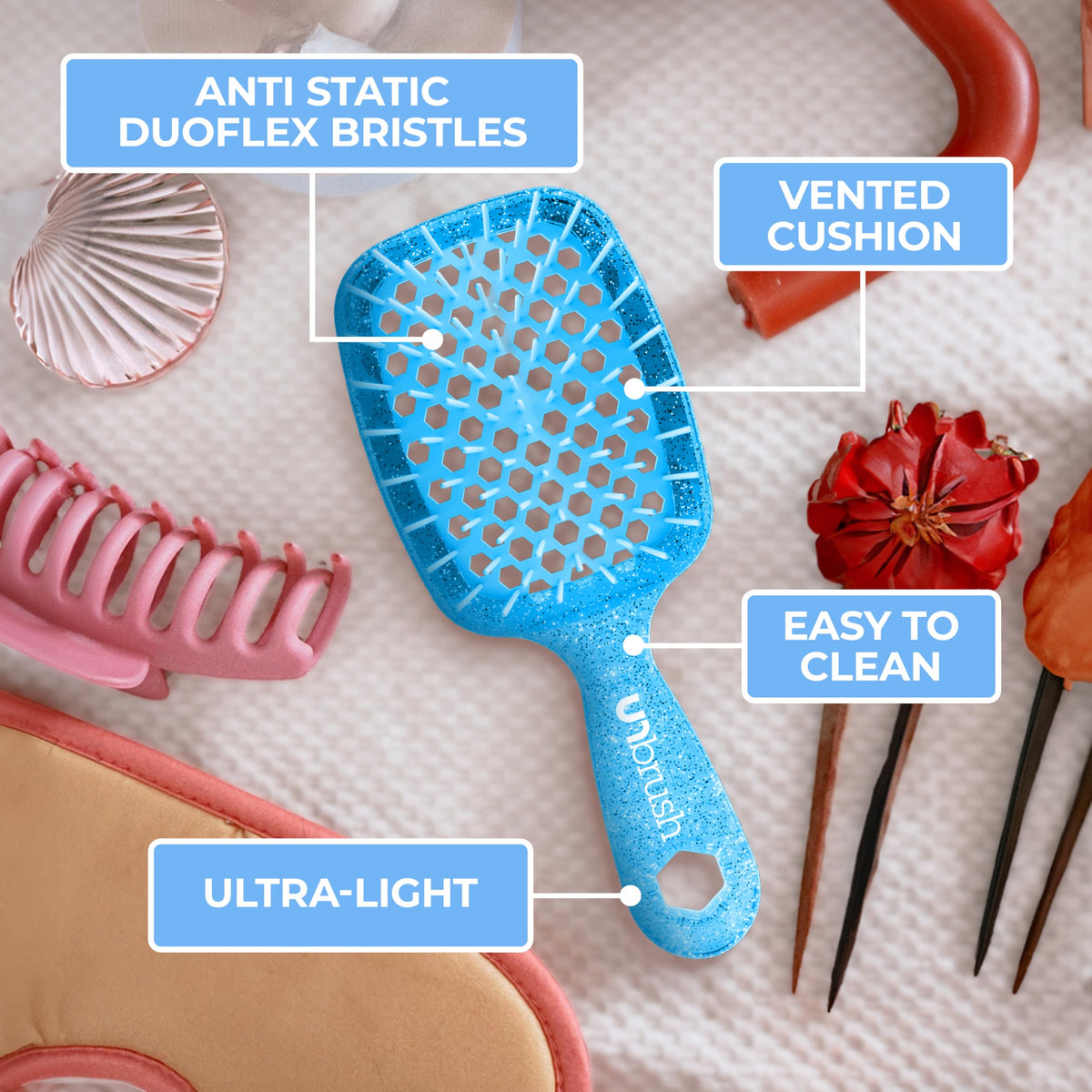 FHI Heat UNbrush Mini showcases 77 dual-length bristles for gentle detangling