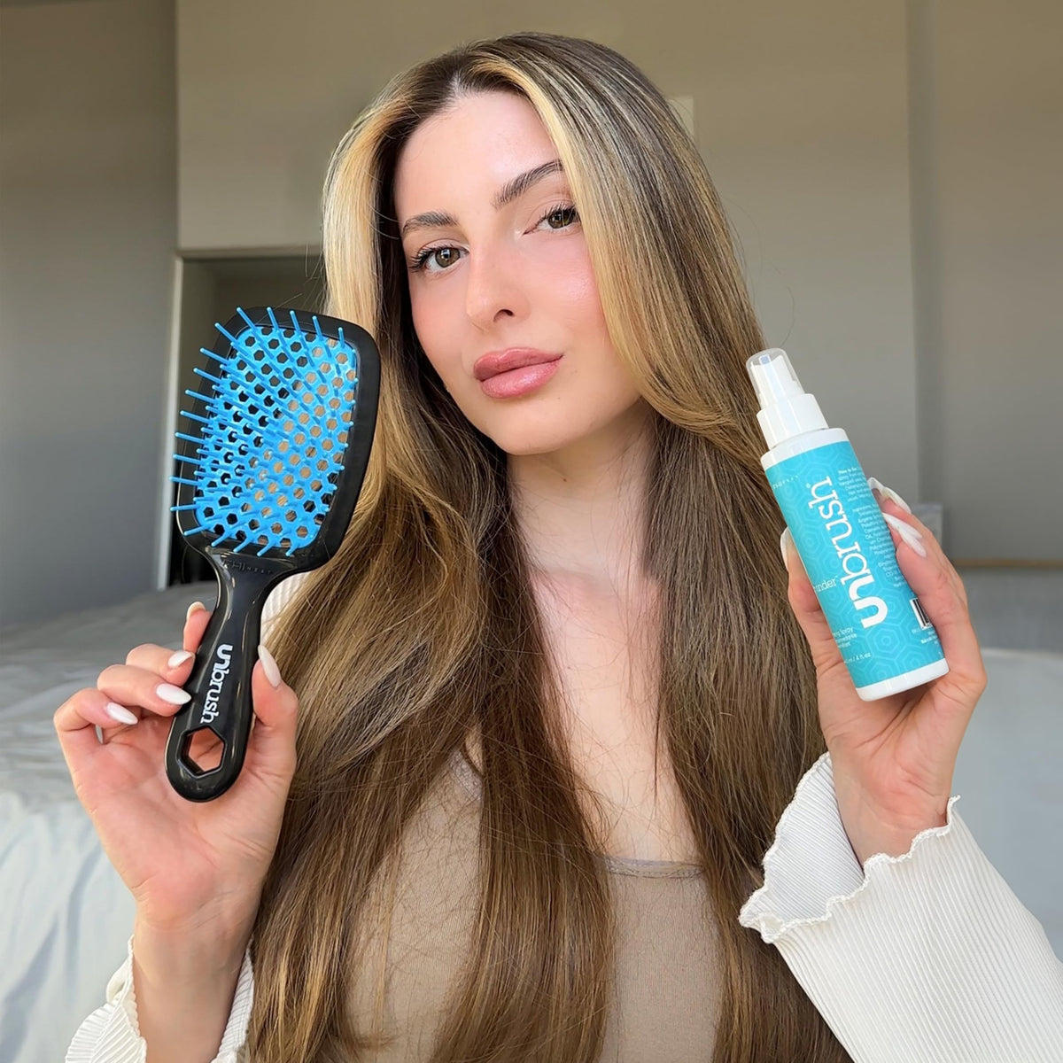 FHI Heat UNwinder Detangler Spray close-up on oil blend providing hydration