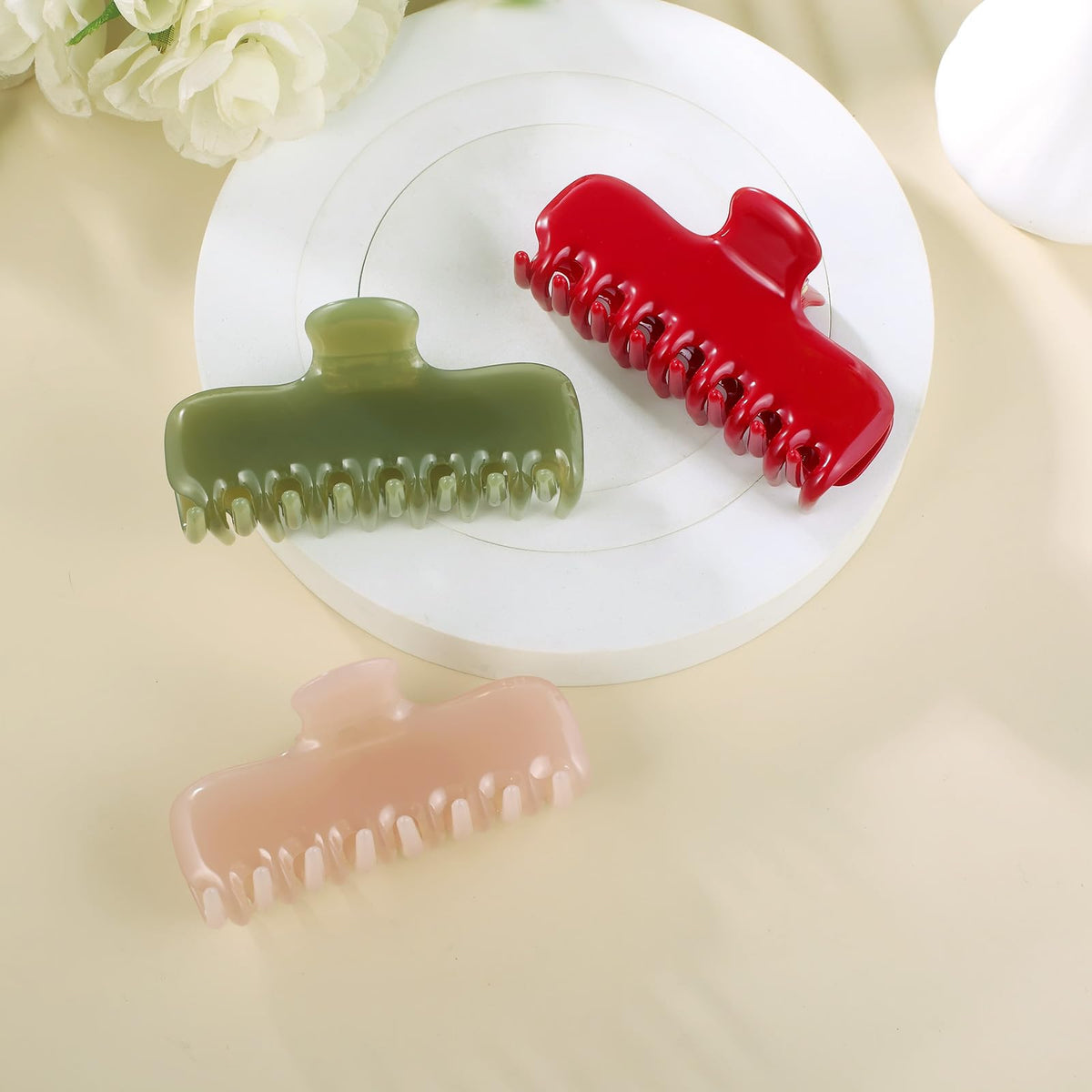 FidesAmor red jelly clip highlights style with secure grip.