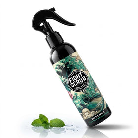 Fight Scrub bottle pours to show the witch hazel formula for post-training hygiene.
