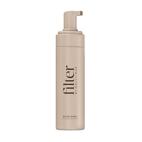 Filter by Molly-Mae Self Tanner Mousse bottle delivers a deep, even bronze glow.