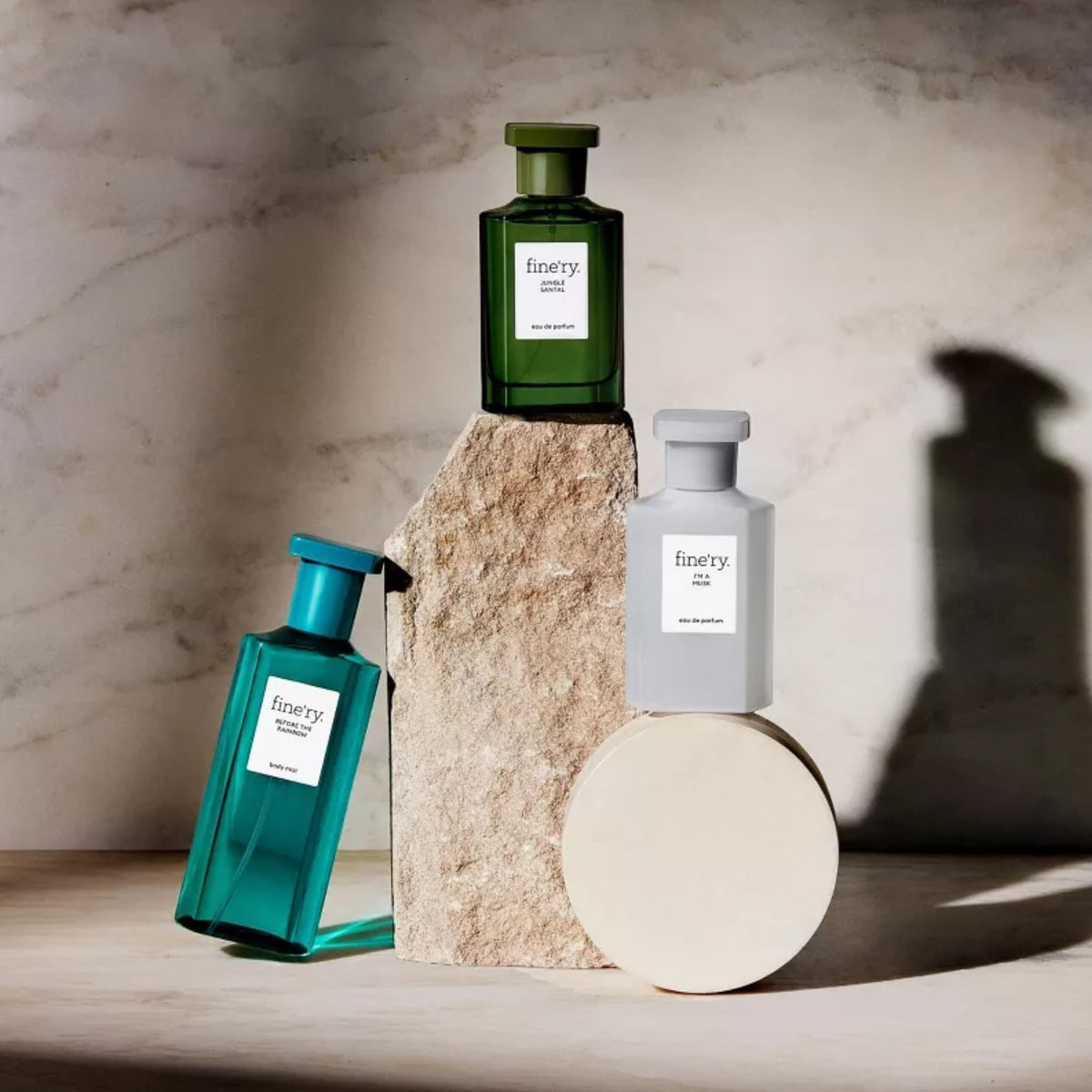 Fine'ry Sea Salt & Bergamot Mist on neck—subtle daily aroma.