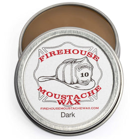 Firehouse Moustache Wax dark tin showing natural color for subtle styling.