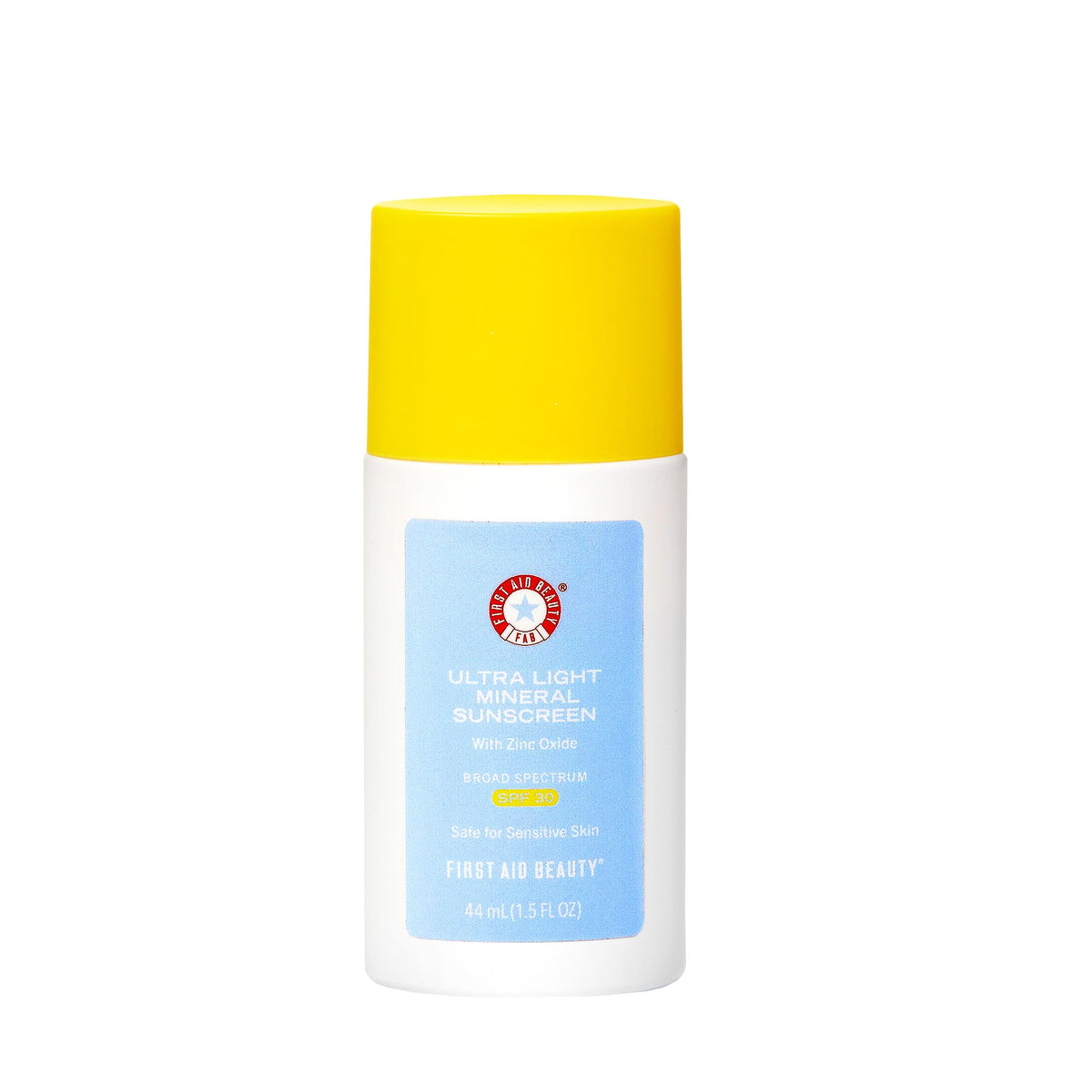 First Aid Beauty weightless sunscreen bottle close-up; sheer tint blends for a natural satin finish.