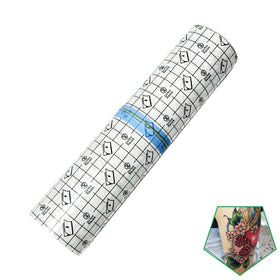 Flatoedu tattoo bandage with grid-lines backpaper enables precise sizing and quick application.