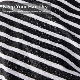 Floraltop waterproof nylon cap guards hair from water while traveling.