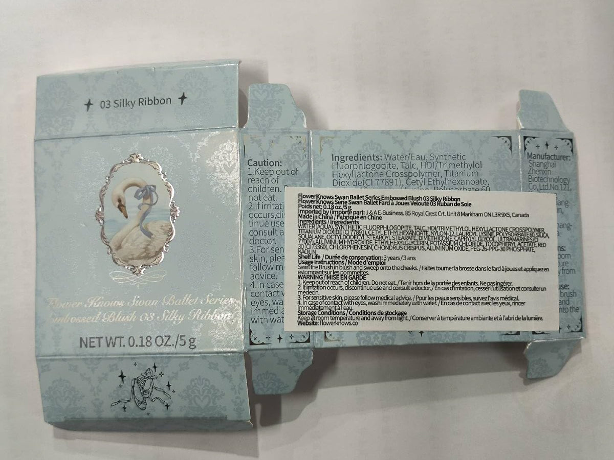 Flower Knows 3D swan embossing adds luxury to display.