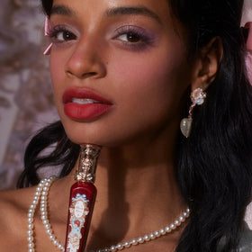 Flower Knows vegan formula icon indicates alcohol-free, hydrating lip care.