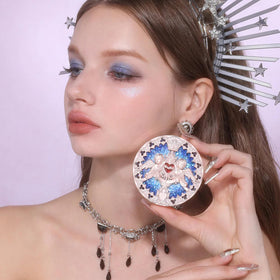 Flower Knows embossed-angel compact adds tactile luxury for precise highlighting