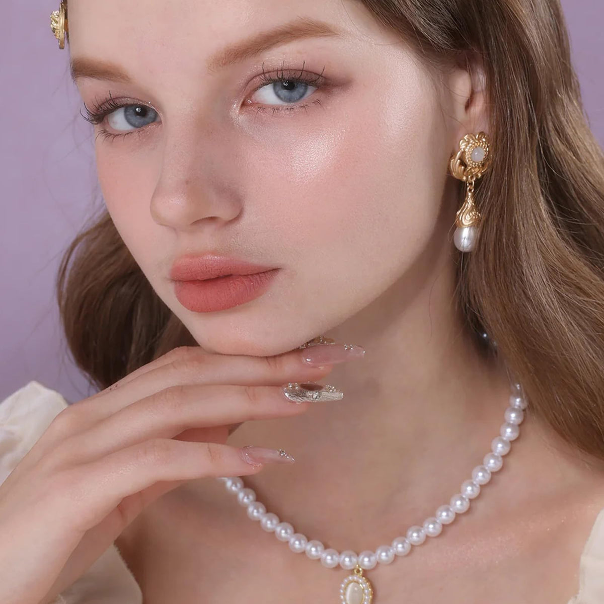 Flower Knows Little Angel Highlighter on the nose bridge adds dewy lift
