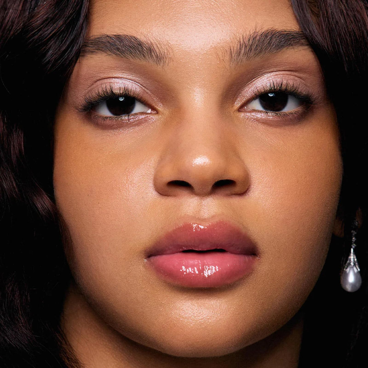 Flower Knows Shell's Jewel dual-color shimmer enhances cheekbone radiance naturally.