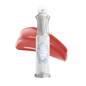 Flower Knows Shells Jewel Nourishing Lip Glaze bottle closeup showing hydrating gloss