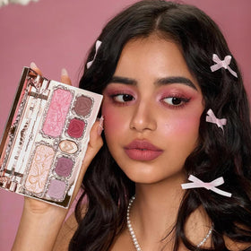 Brush applying Cupid's Mischief shadow for precise color payoff