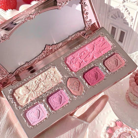 Model wearing soft pink eye look with Cupid's Mischief shades