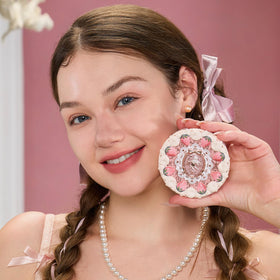Flower Knows Strawberry Cupid pressed powder on skin delivers a matte, long-lasting finish.