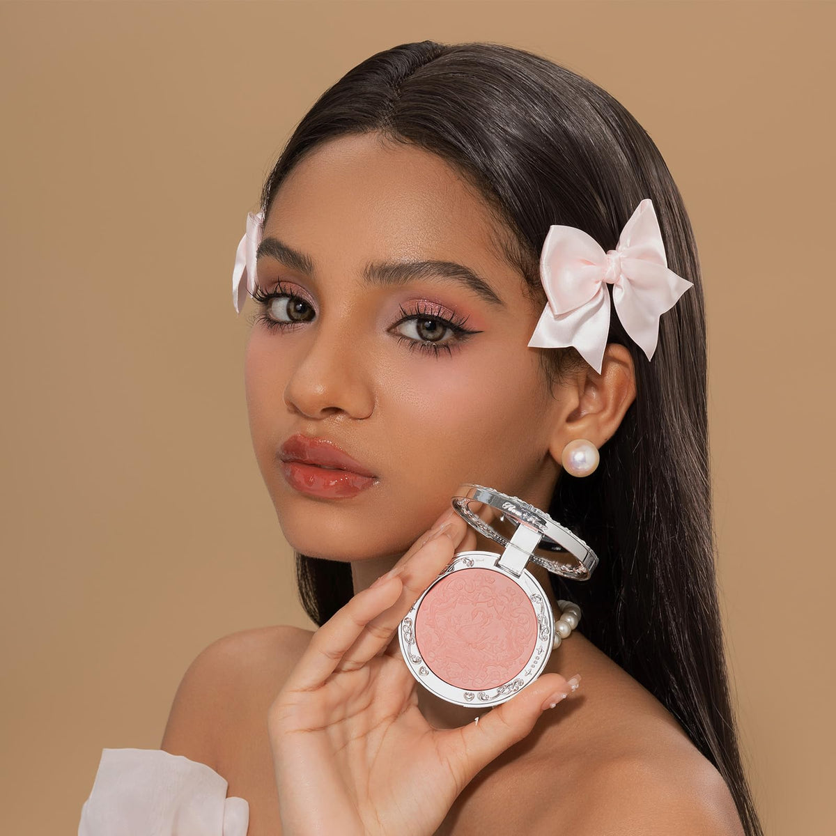 Flower Knows Swan Ballet matte finish on cheeks offers soft color.