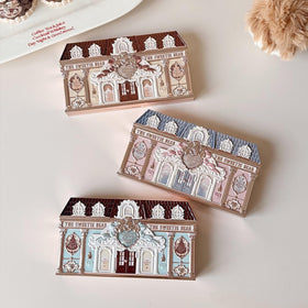 Flower Knows Sweetie Bear lid detail features neoclassical motif.