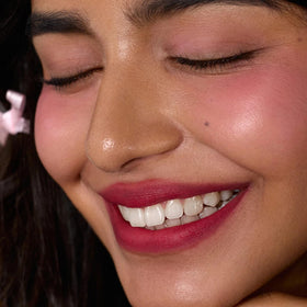 Flower Knows transfer-proof wear demonstration suggests all-day color stability.