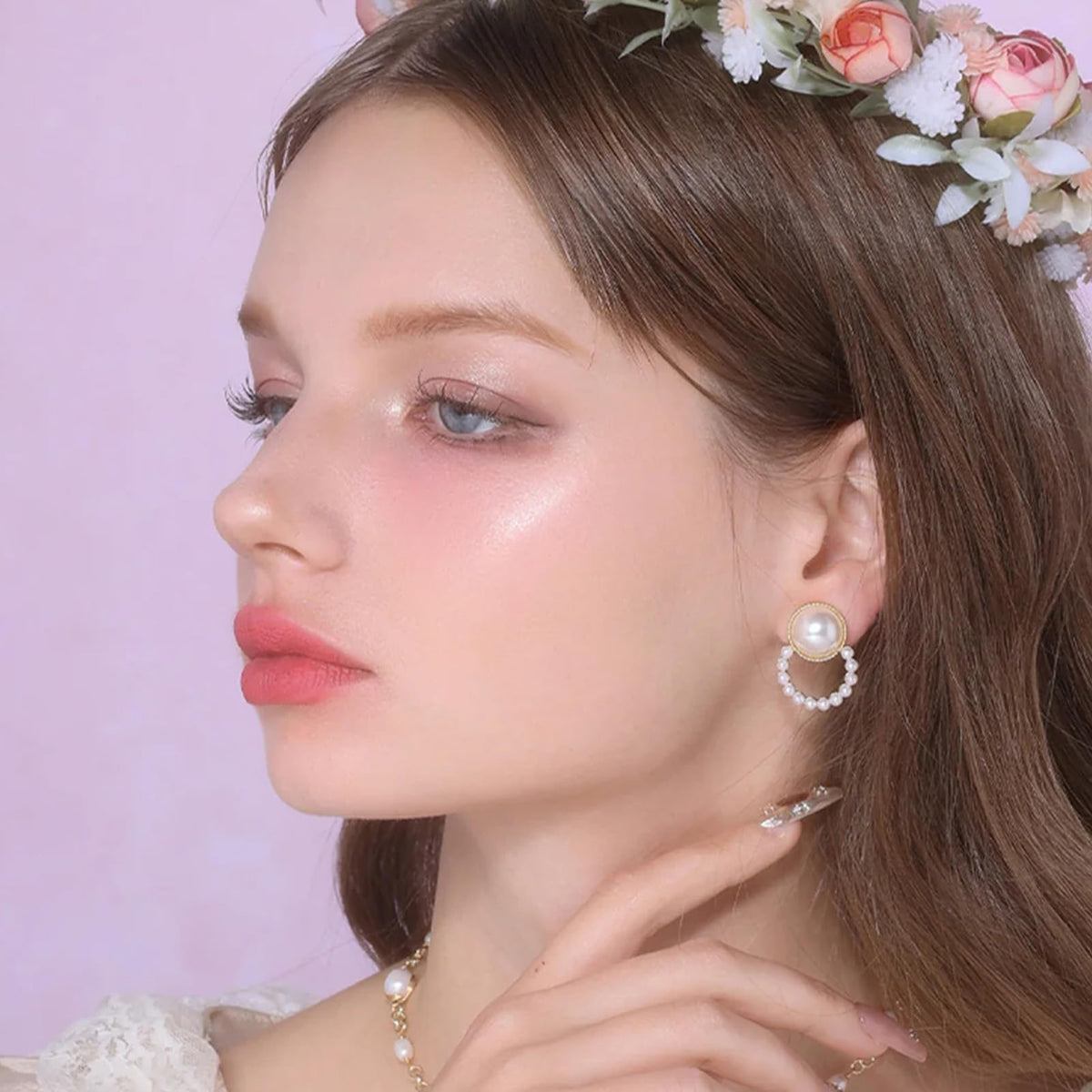 Flower Knows Weightless Angel Glow highlighter buildable radiance for a gentle lift.