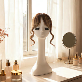 Flufymooz chocolate brown with blonde highlights blends with varied hair tones.