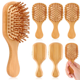 FoldTier mini bamboo hair brush with compact travel design for on-the-go detangling