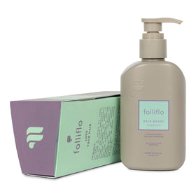 Folliflo Hair Boost Shampoo bottle pour showing daily cleansing for fuller hair.