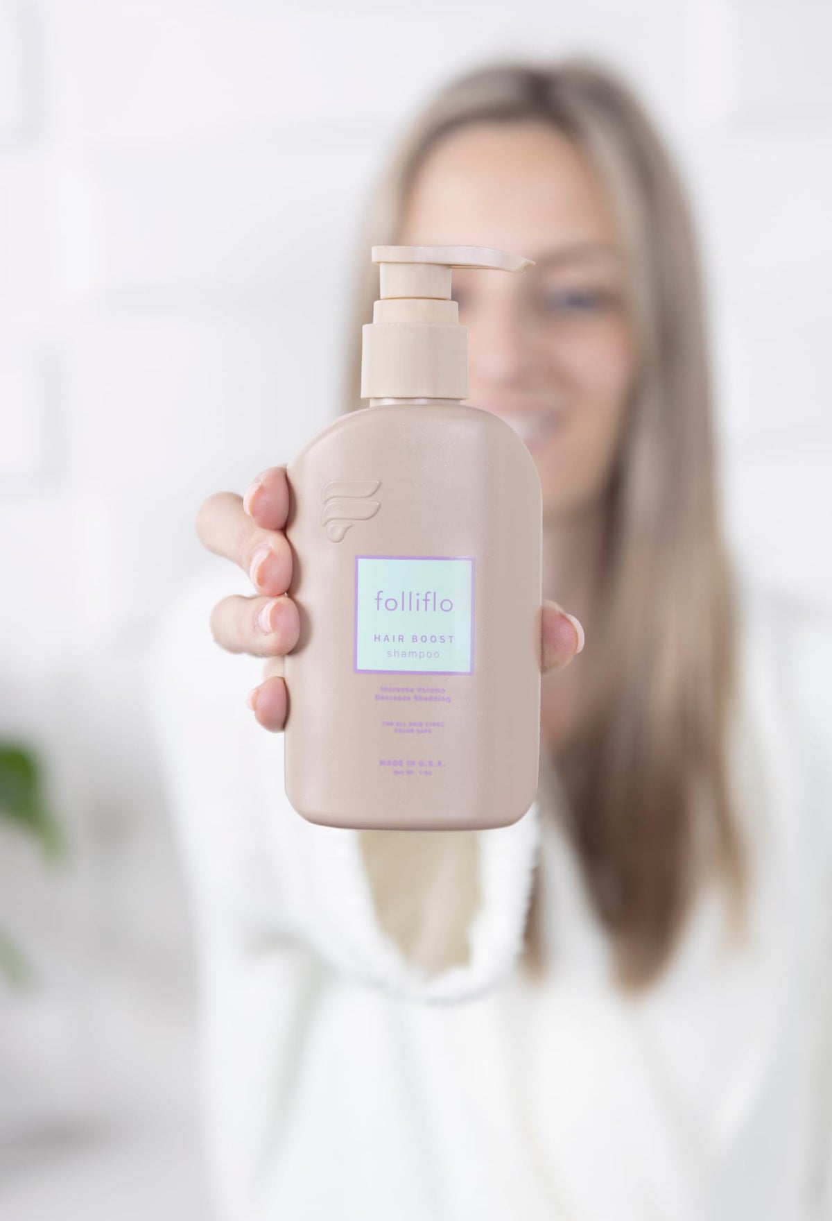 Folliflo Hair Boost Shampoo softens strands for smoother styling.