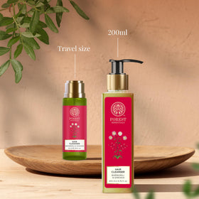 Forest Essentials hair cleanser application on wet hair demonstrates usage.