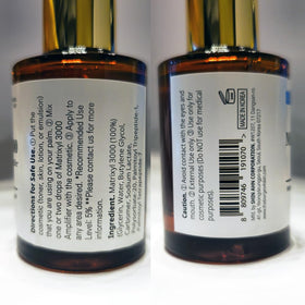 Close-up of the Matrixyl 3000 Amplifier serum dropper dispensing product.