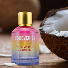 Forever 21 Shimmering Passionfruit bottle top, compact travel-friendly aroma on the go.