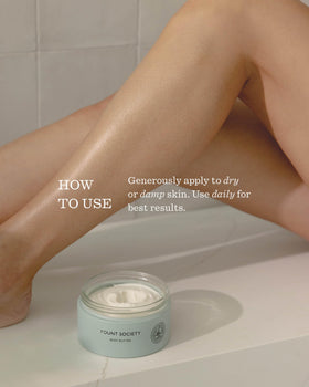 Hand applying Fount Society Body Butter with a light, non-greasy finish
