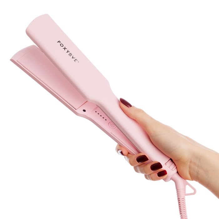 FoxyBae Sleek & Slay in-use demonstrates smooth straightening and curl versatility.