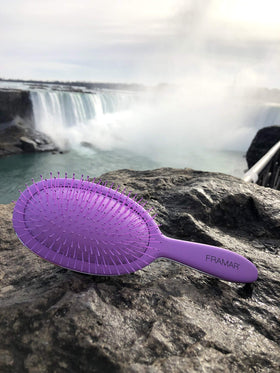 FRAMAR detangling brush available in four colors with Silver Lining