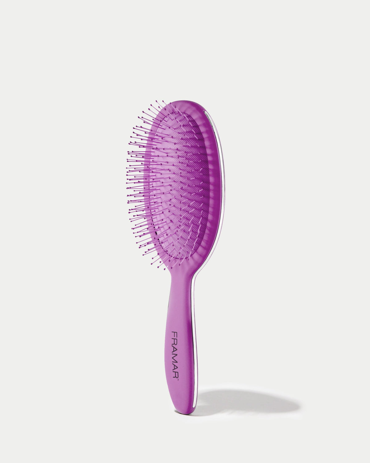 Quick detangling with FRAMAR brush saving time in busy mornings