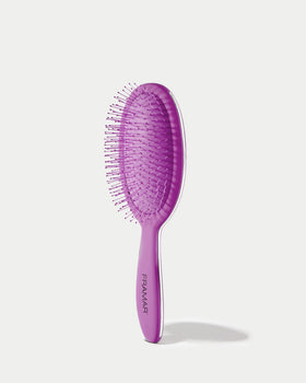 Quick detangling with FRAMAR brush saving time in busy mornings