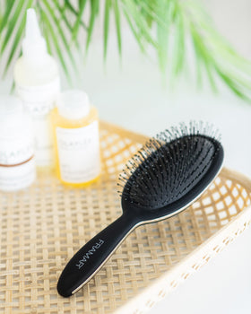 FRAMAR Detangling Brush travel-friendly design for on-the-go use.